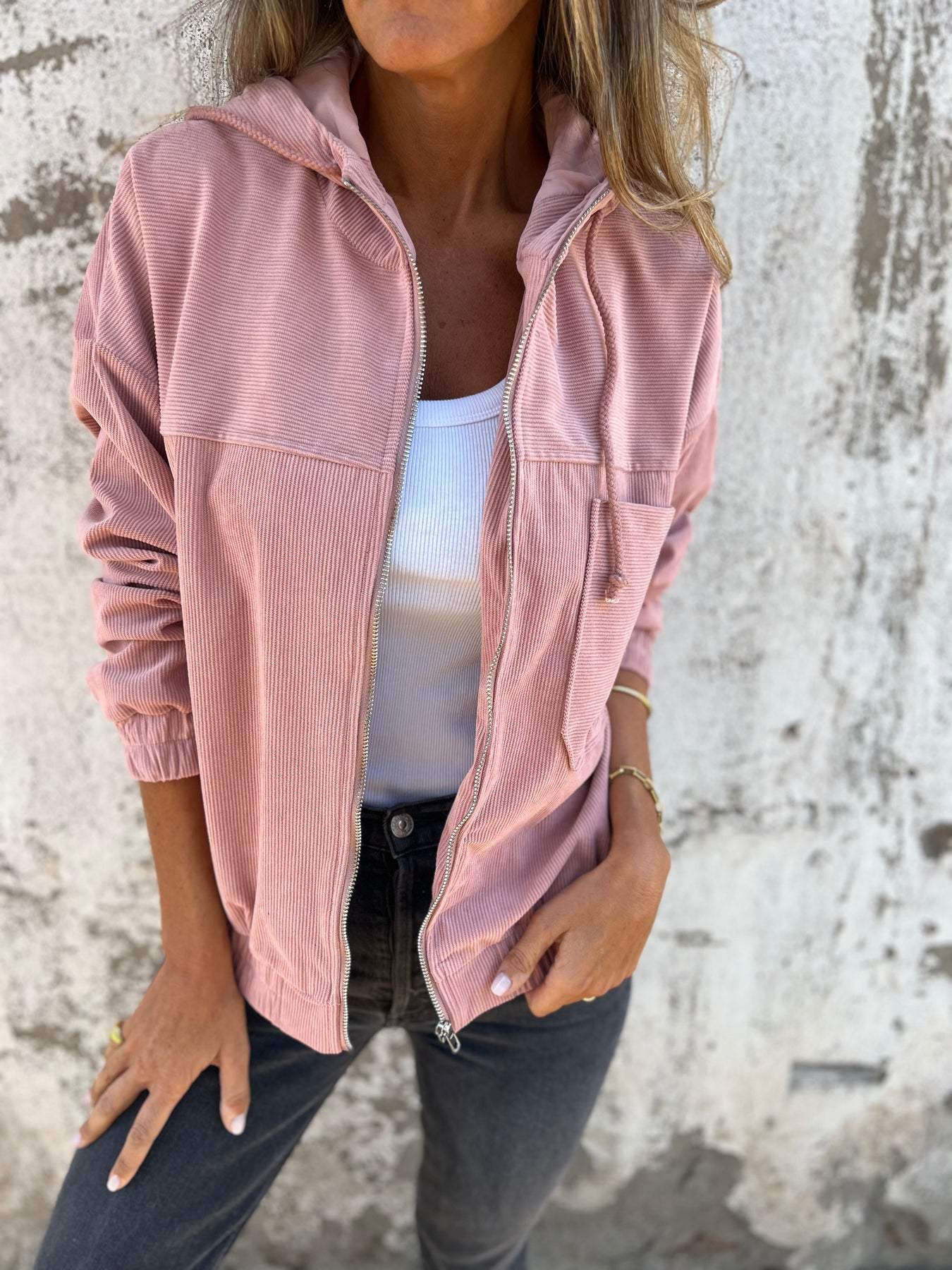 Women's casual jacket with hood and zipper.